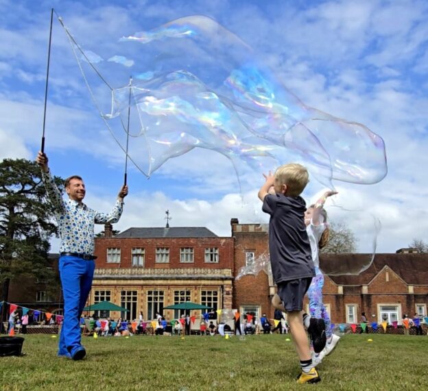 Gigantic Bubbles Easter 2025 in Surrey. Bubbleology, Circus Surrey, Circus London